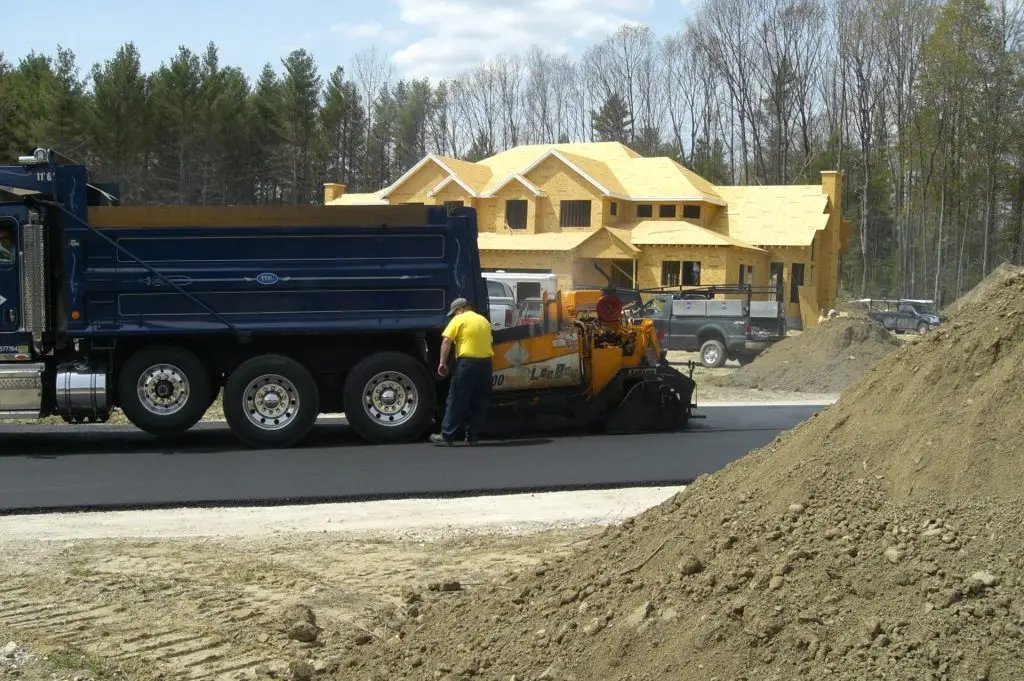 Tri-Town Paving dump truck and paver on a job site